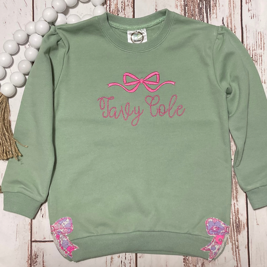 WOMENS SWEATSHIRT W/APPLIQUE BOW ON SIDES